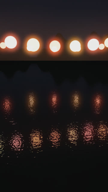 Rain on a Pond: Lanterns, interfering ripple rings